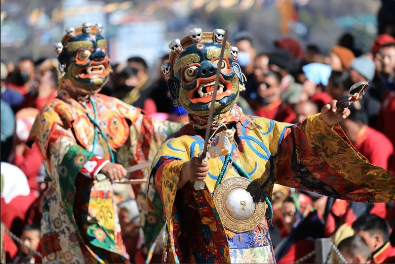 Masked Torgya dancers mid-performance